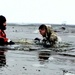 6th Marine Regiment troops jump in for cold-water immersion training at Fort McCoy