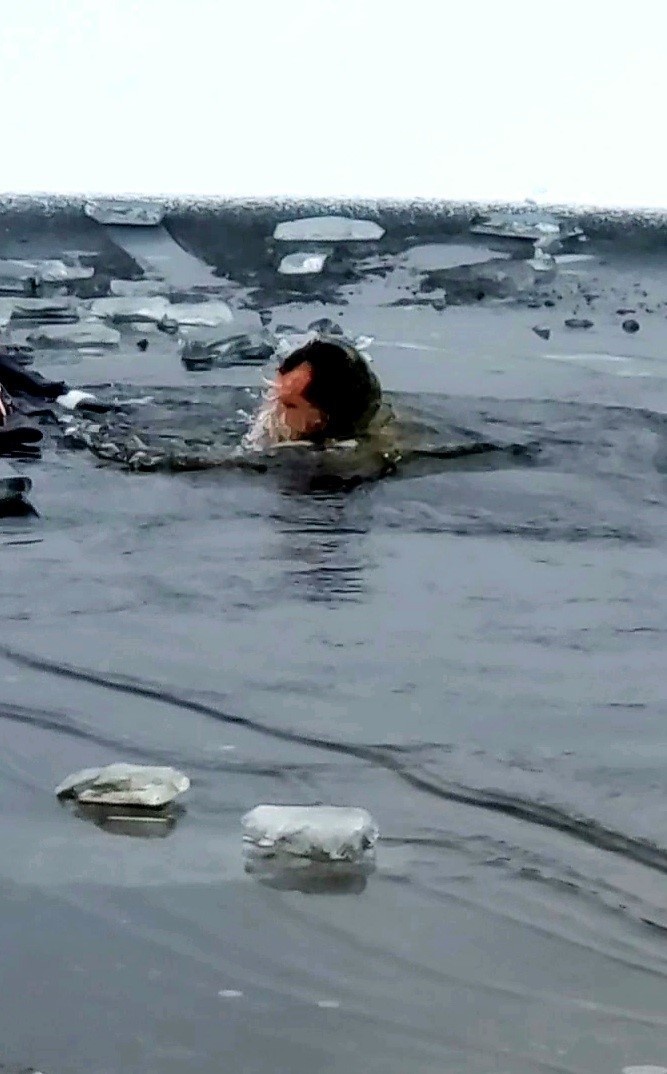 6th Marine Regiment troops jump in for cold-water immersion training at Fort McCoy