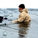 6th Marine Regiment troops jump in for cold-water immersion training at Fort McCoy