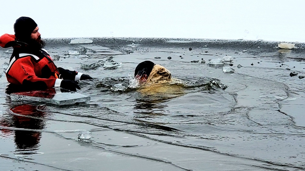 6th Marine Regiment troops jump in for cold-water immersion training at Fort McCoy