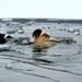 6th Marine Regiment troops jump in for cold-water immersion training at Fort McCoy