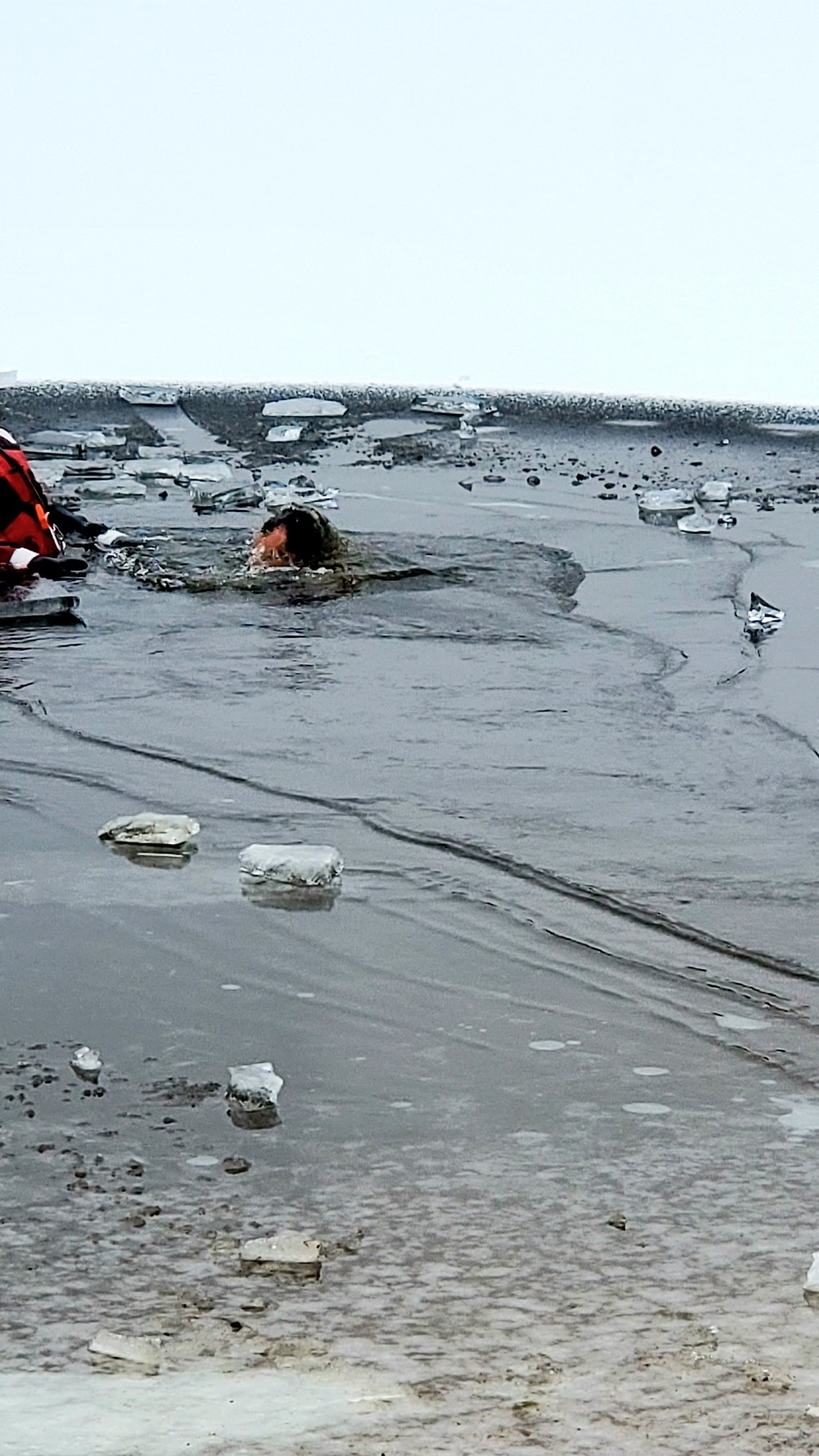 6th Marine Regiment troops jump in for cold-water immersion training at Fort McCoy