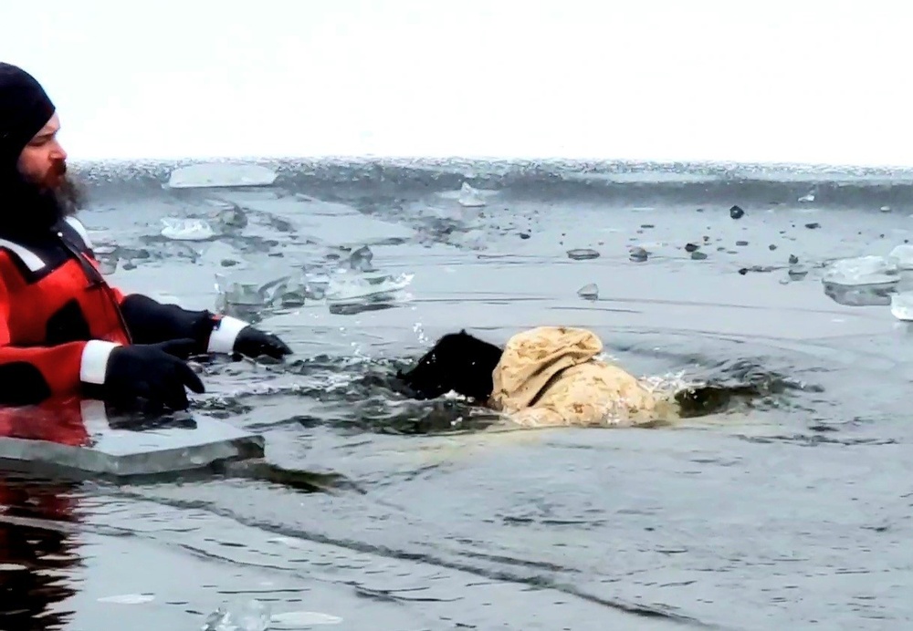 6th Marine Regiment troops jump in for cold-water immersion training at Fort McCoy