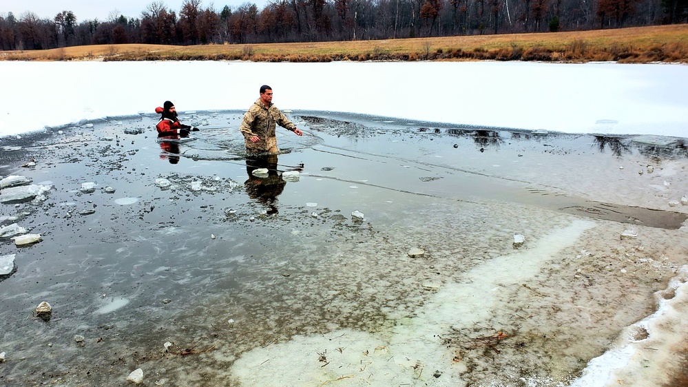 6th Marine Regiment troops jump in for cold-water immersion training at Fort McCoy