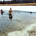6th Marine Regiment troops jump in for cold-water immersion training at Fort McCoy