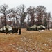 Marines practice tent building during Cold-Weather Operations Course training at Fort McCoy