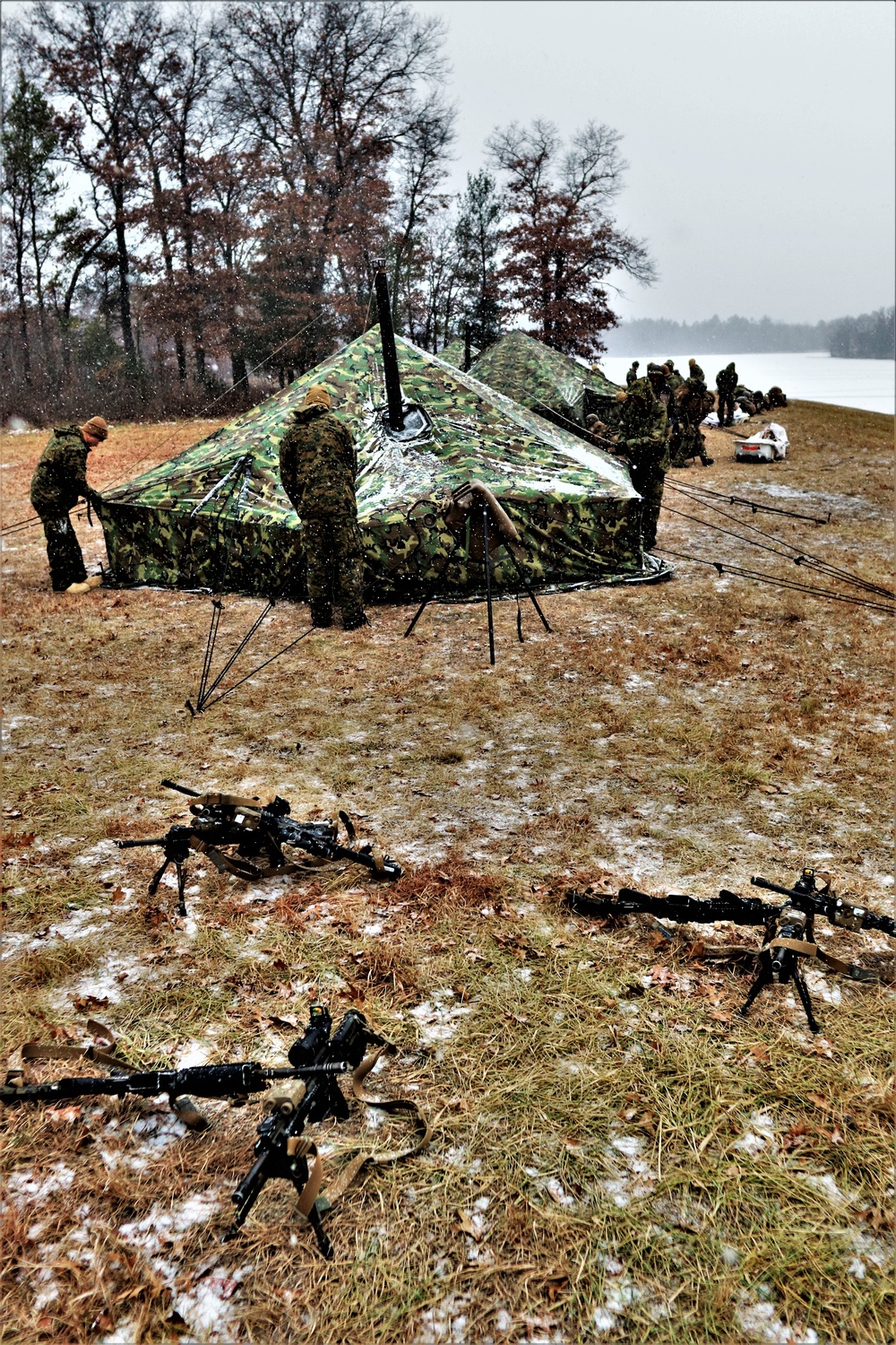 Marines practice tent building during Cold-Weather Operations Course training at Fort McCoy