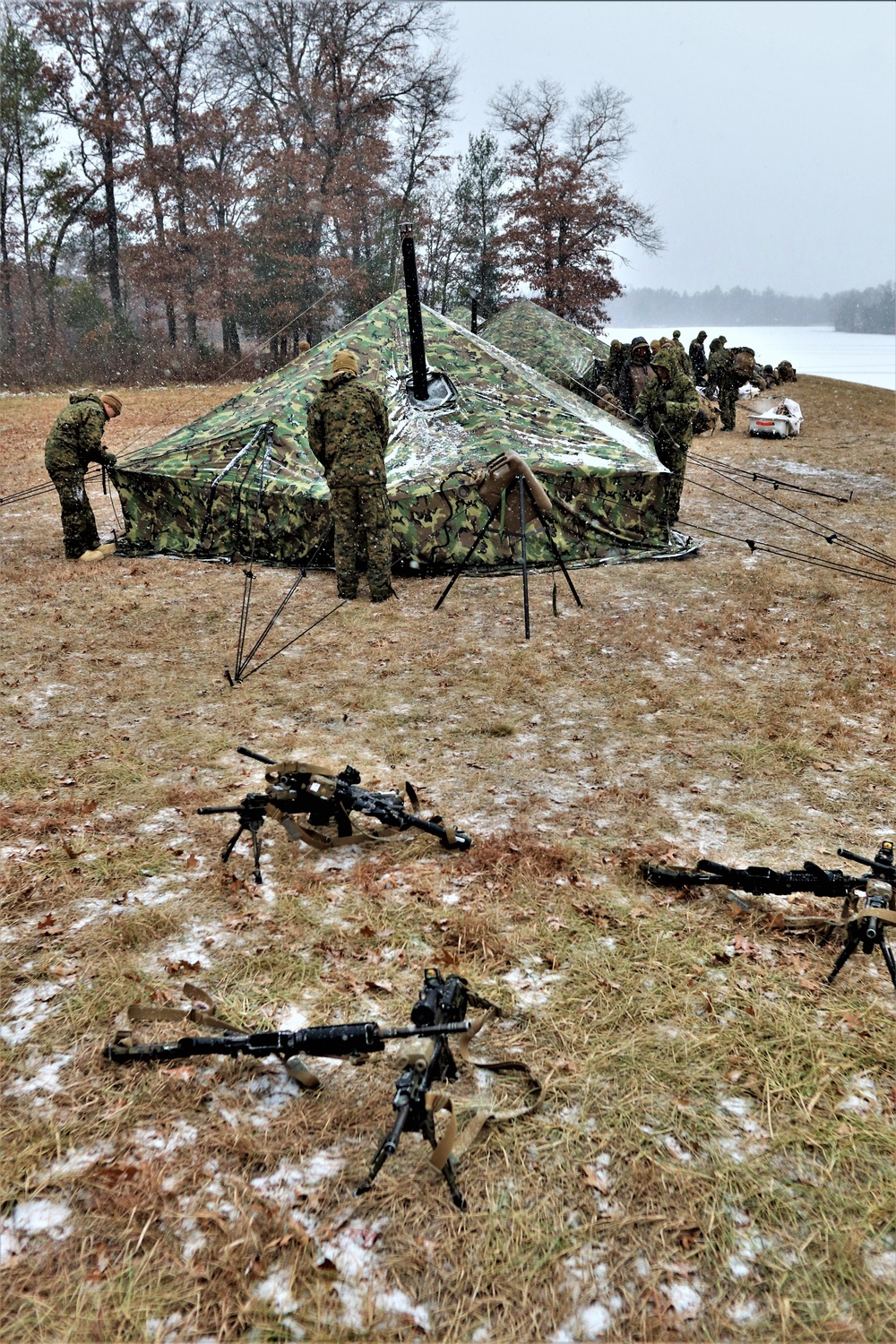 Marines practice tent building during Cold-Weather Operations Course training at Fort McCoy