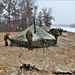 Marines practice tent building during Cold-Weather Operations Course training at Fort McCoy