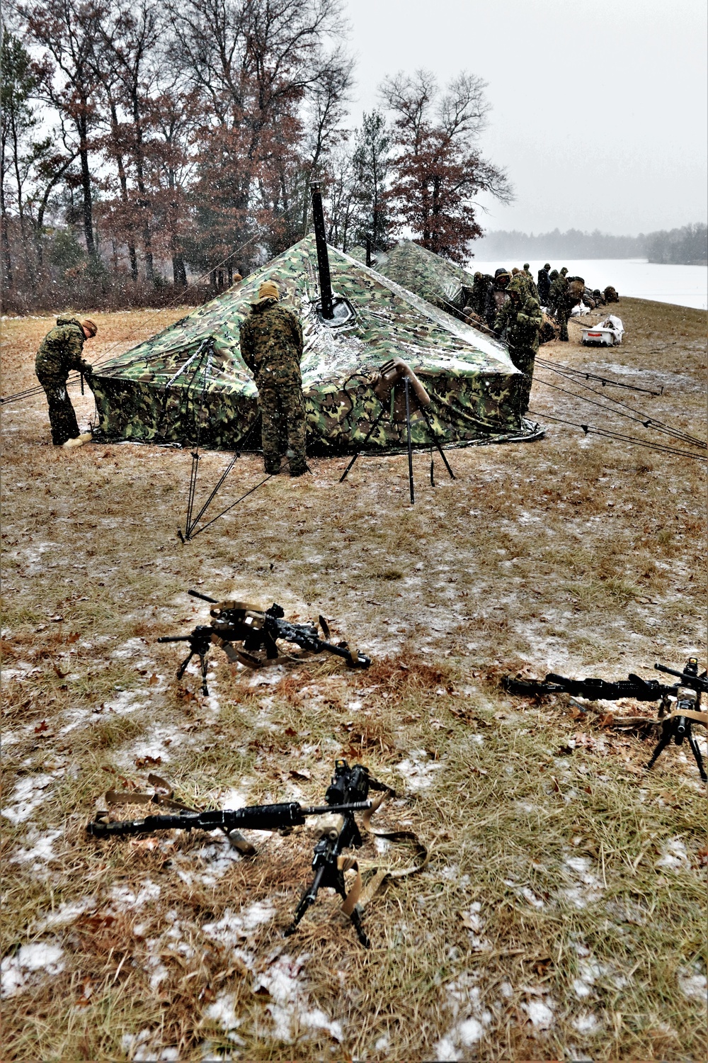 Marines practice tent building during Cold-Weather Operations Course training at Fort McCoy