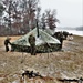 Marines practice tent building during Cold-Weather Operations Course training at Fort McCoy