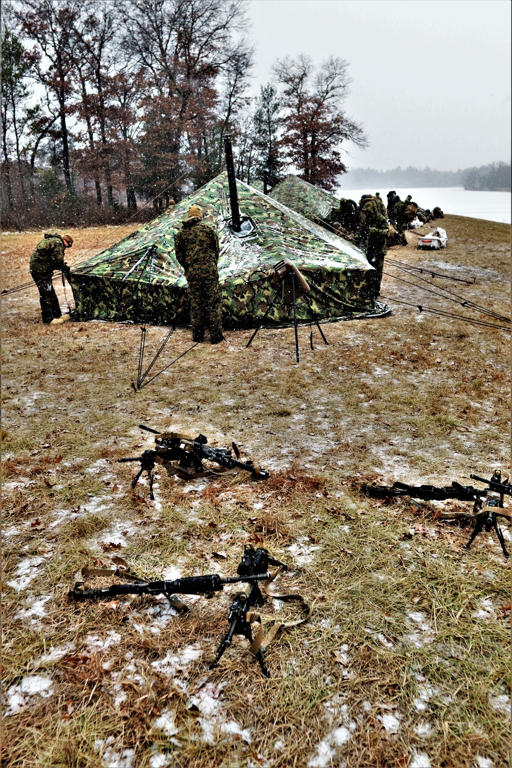 Marines practice tent building during Cold-Weather Operations Course training at Fort McCoy