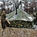 Marines practice tent building during Cold-Weather Operations Course training at Fort McCoy