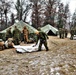 Marines practice tent building during Cold-Weather Operations Course training at Fort McCoy