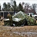 Marines practice tent building during Cold-Weather Operations Course training at Fort McCoy