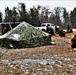 Marines practice tent building during Cold-Weather Operations Course training at Fort McCoy