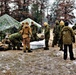 Marines practice tent building during Cold-Weather Operations Course training at Fort McCoy