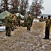 Marines practice tent building during Cold-Weather Operations Course training at Fort McCoy