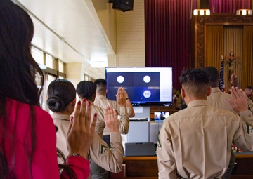 U.S. Marines conduct a naturalization ceremony on Camp Foster