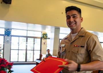 U.S. Marines conduct a naturalization ceremony on Camp Foster