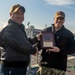 USS Higgins (DDG 76) Receives USS Arizona Relic