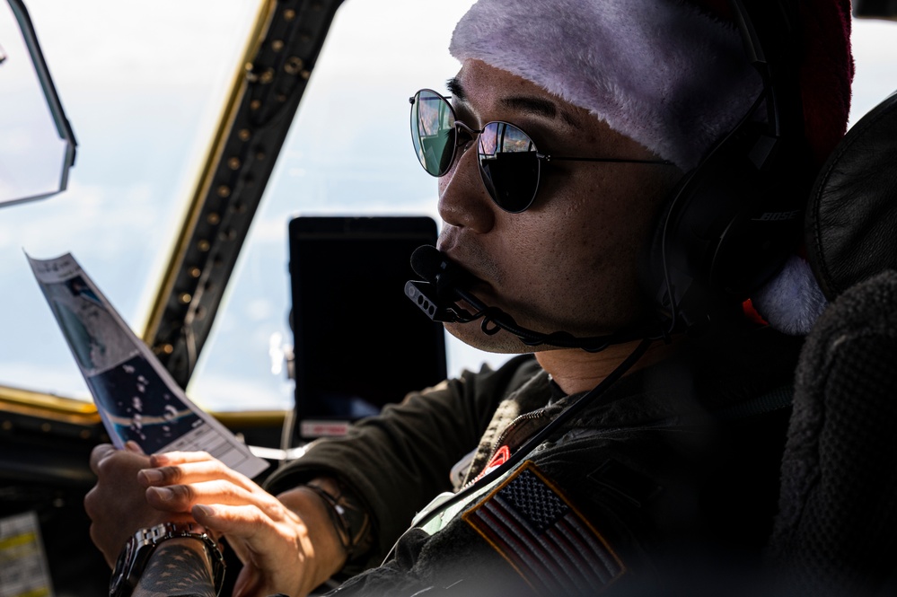 C-130s deliver presents for Operation Christmas Drop 70