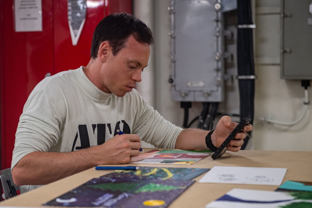 USS Carl Vinson (CVN 70) Conducts Holiday Paint Night and Art Show