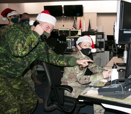 Airmen at the Eastern Air Defense Sector in Rome, New York train for Santa tracking operations.