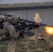 Soldier fires M240 at Rising Thunder
