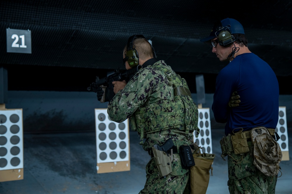 Special Warfare Boat Operator candidates practice small arms marksmanship