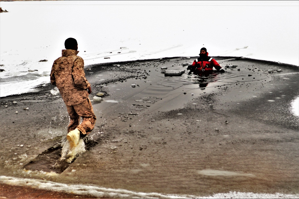 Marines jump in for cold-water immersion training during CWOC ops at Fort McCoy