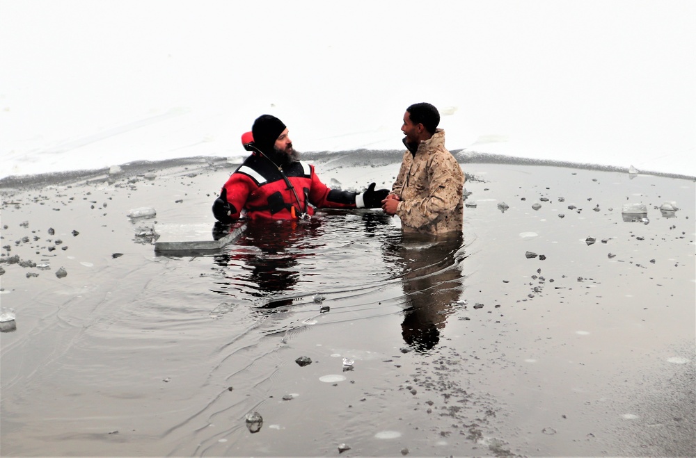 Marines jump in for cold-water immersion training during CWOC ops at Fort McCoy