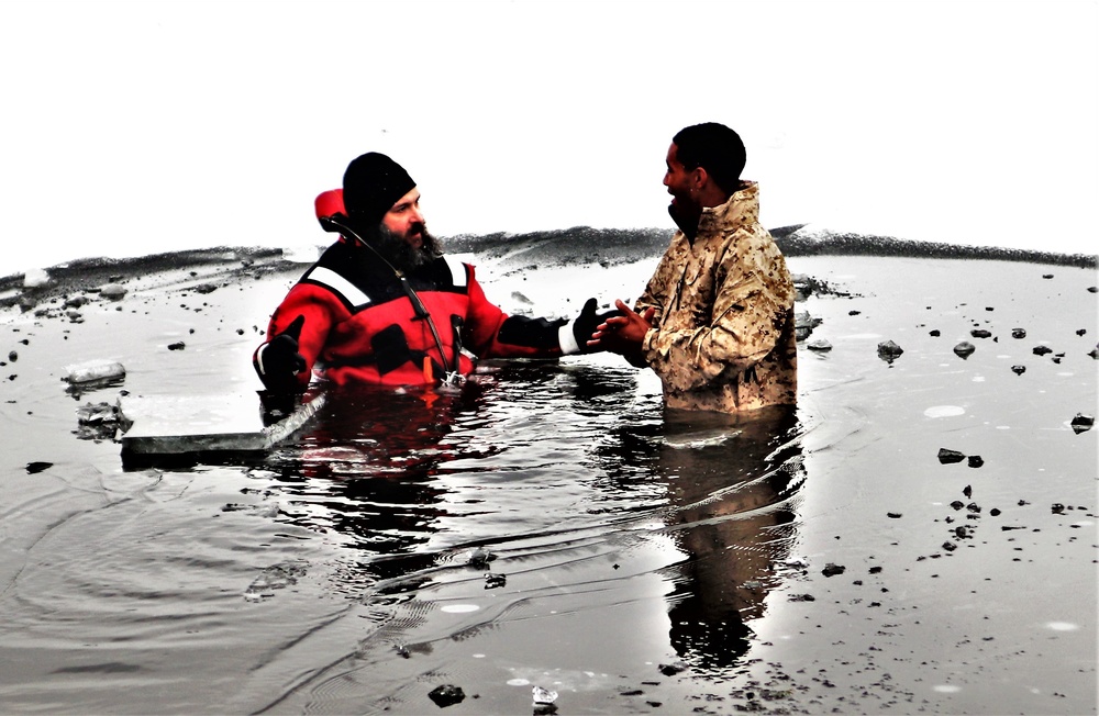 Marines jump in for cold-water immersion training during CWOC ops at Fort McCoy