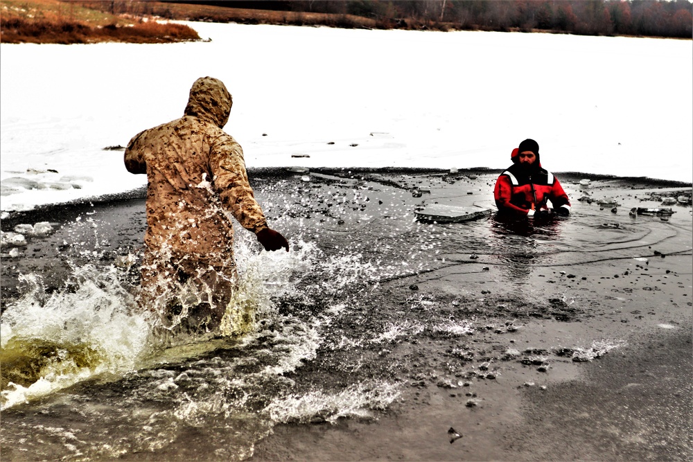 Marines jump in for cold-water immersion training during CWOC ops at Fort McCoy