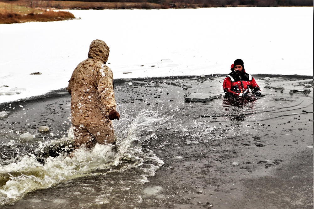 Marines jump in for cold-water immersion training during CWOC ops at Fort McCoy