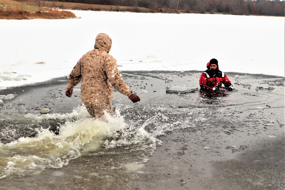 Marines jump in for cold-water immersion training during CWOC ops at Fort McCoy