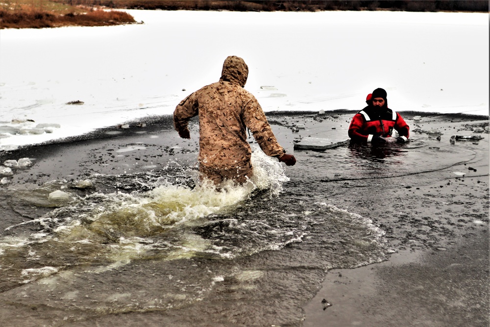 Marines jump in for cold-water immersion training during CWOC ops at Fort McCoy