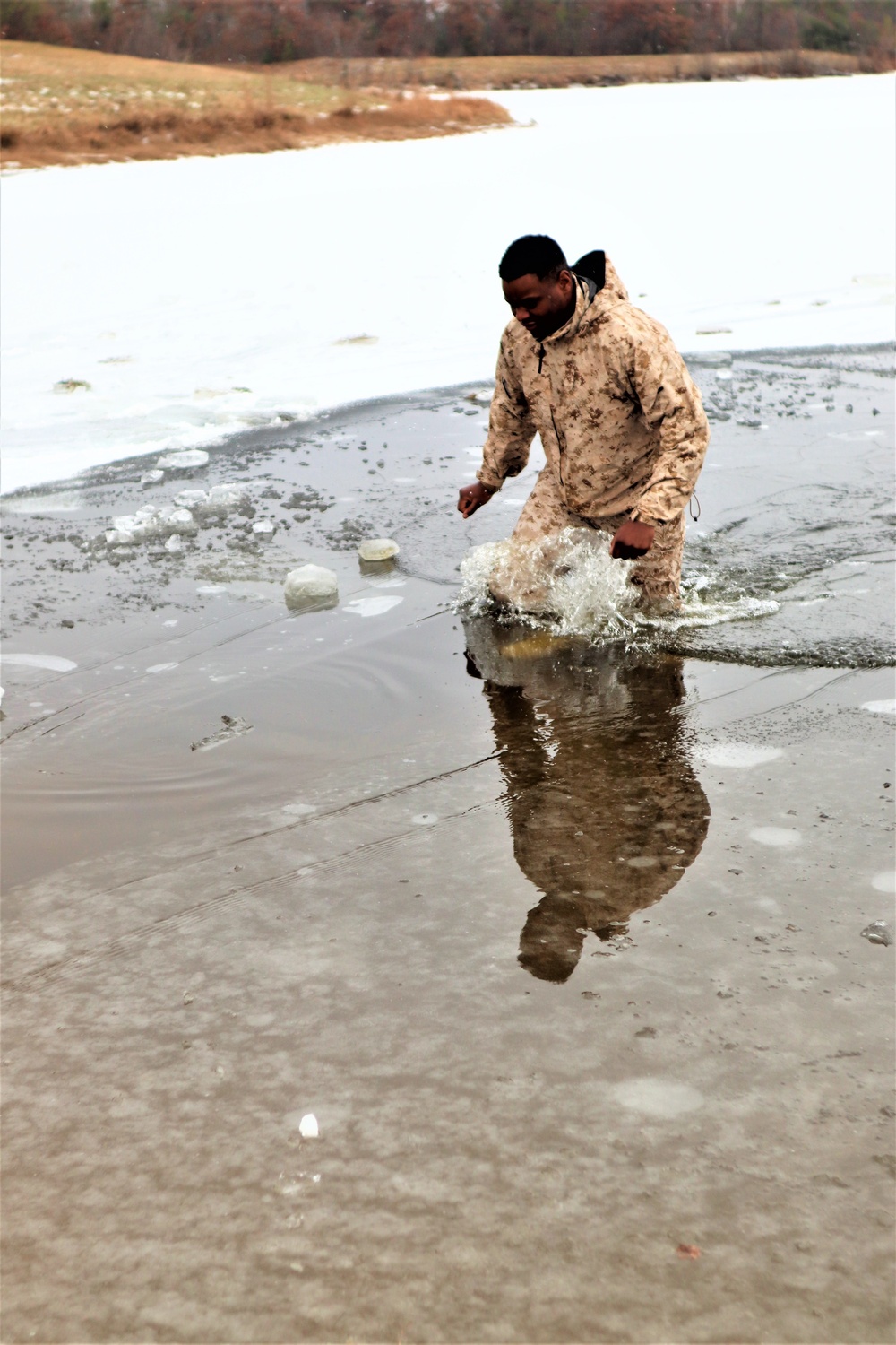 Marines jump in for cold-water immersion training during CWOC ops at Fort McCoy