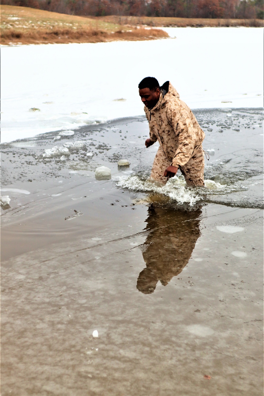 Marines jump in for cold-water immersion training during CWOC ops at Fort McCoy