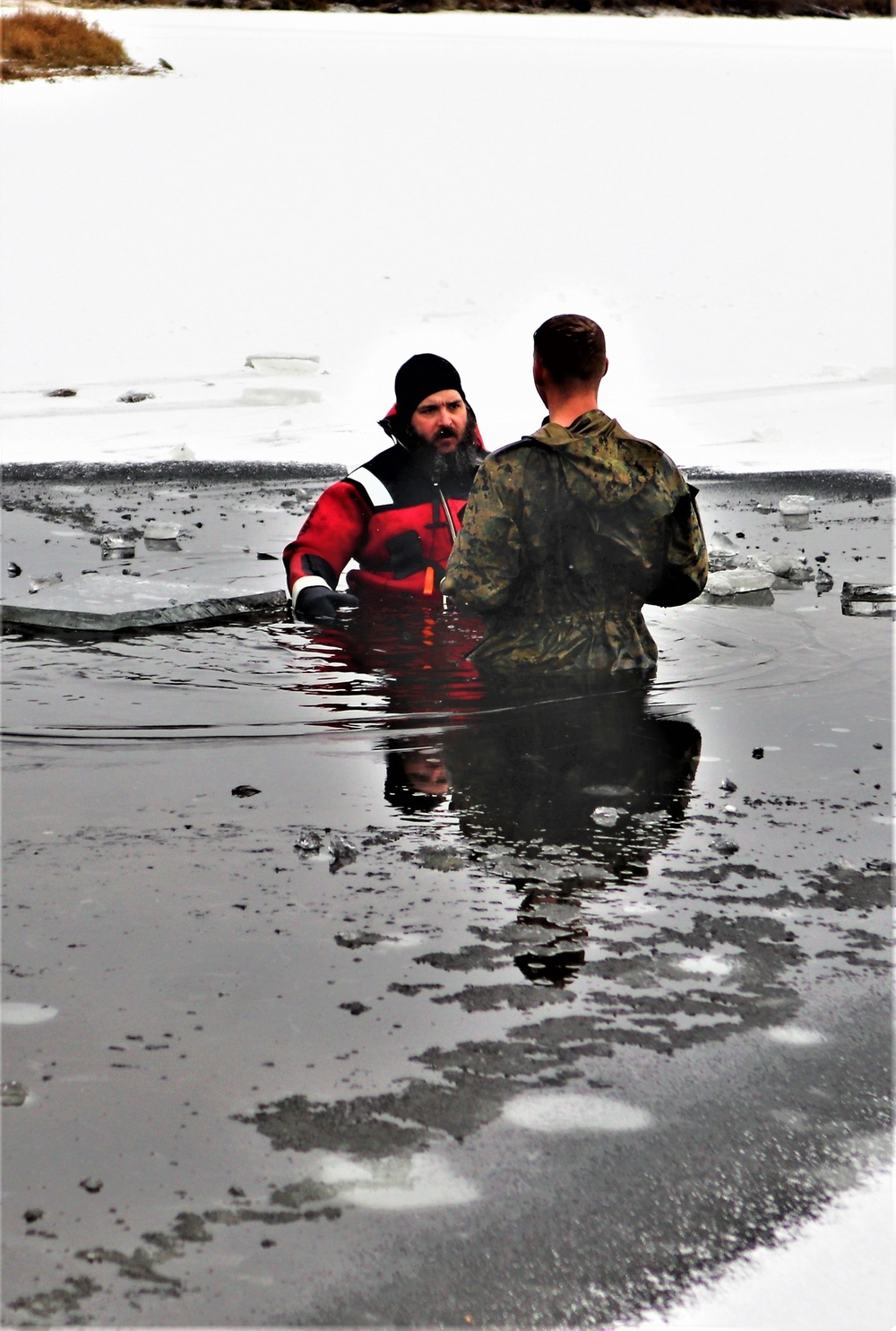 Marines jump in for cold-water immersion training during CWOC ops at Fort McCoy