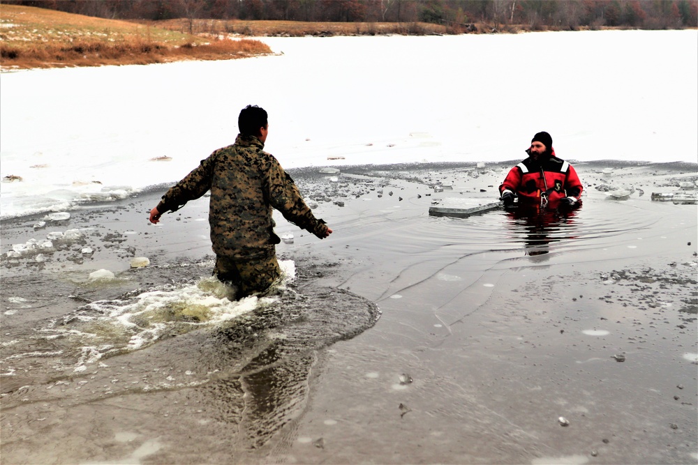 Marines jump in for cold-water immersion training during CWOC ops at Fort McCoy