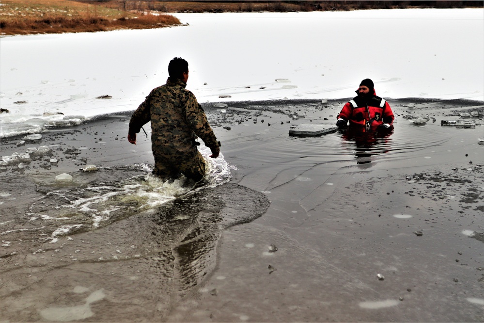 Marines jump in for cold-water immersion training during CWOC ops at Fort McCoy