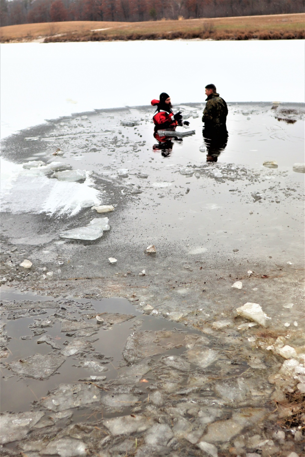 Marines jump in for cold-water immersion training during CWOC ops at Fort McCoy