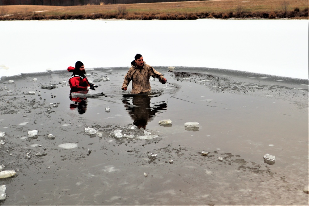 Marines jump in for cold-water immersion training during CWOC ops at Fort McCoy