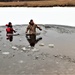 Marines jump in for cold-water immersion training during CWOC ops at Fort McCoy