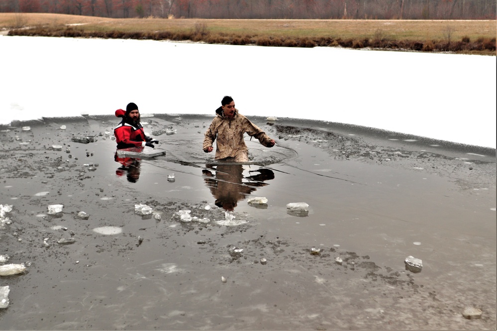 Marines jump in for cold-water immersion training during CWOC ops at Fort McCoy