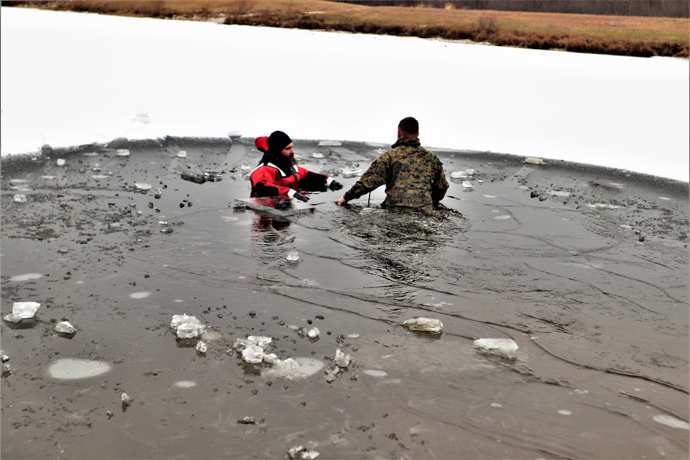 Marines jump in for cold-water immersion training during CWOC ops at Fort McCoy