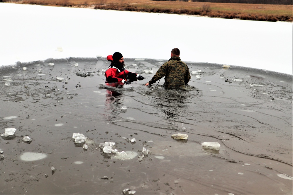 Marines jump in for cold-water immersion training during CWOC ops at Fort McCoy