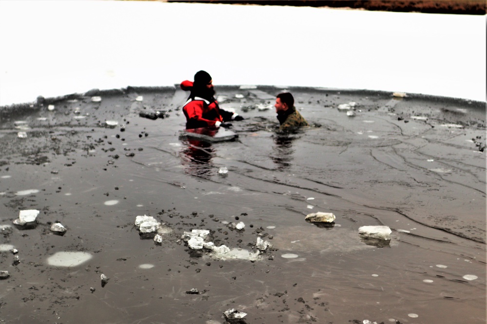 Marines jump in for cold-water immersion training during CWOC ops at Fort McCoy