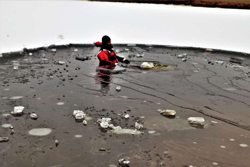 Marines jump in for cold-water immersion training during CWOC ops at Fort McCoy